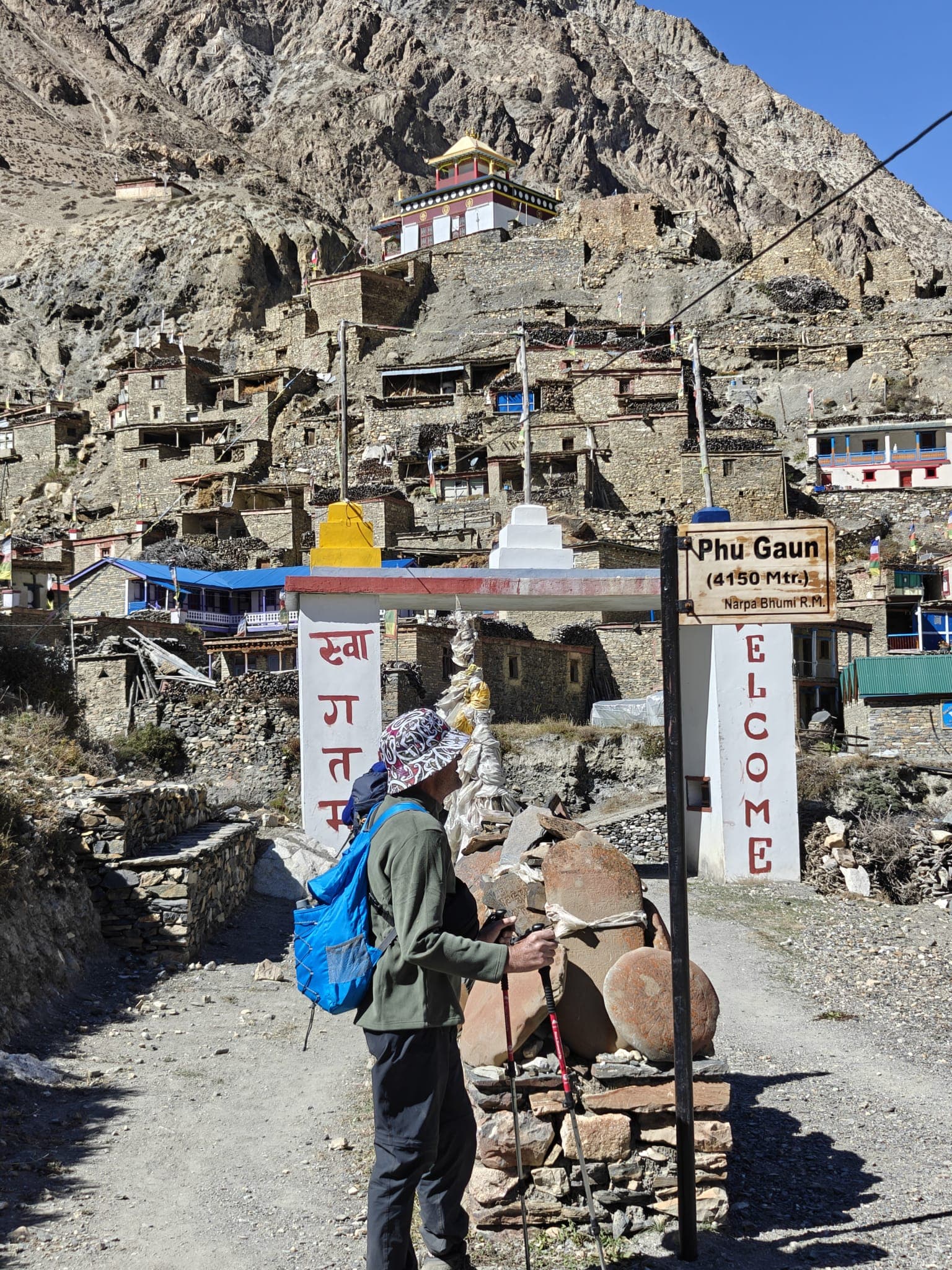 Trekker at Phu Gaun village (4150m) nestled high in the rugged Himalayas